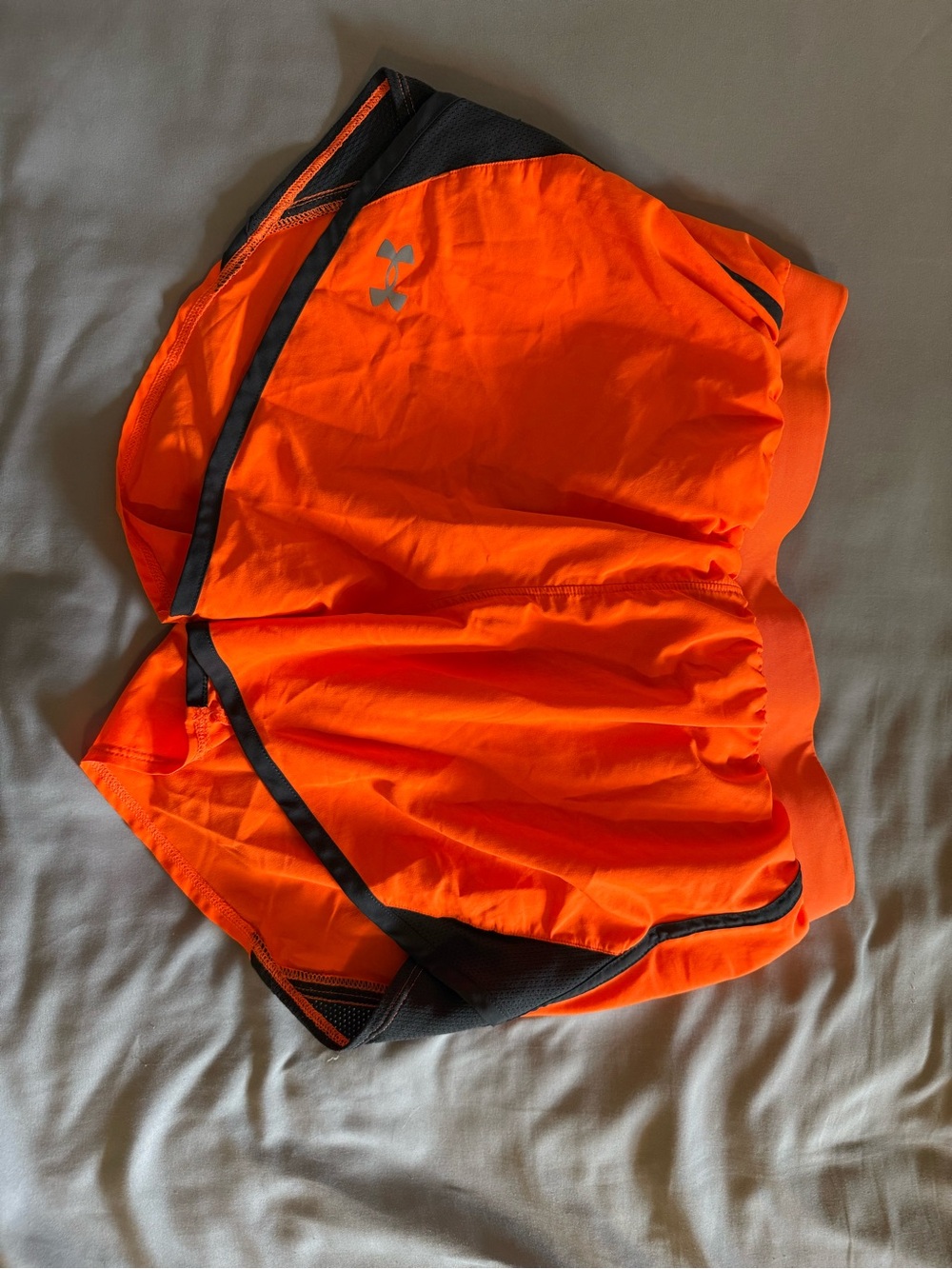 Under Armour women's Orange Performance Running Shorts